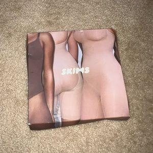Skims  Brief Body Suit